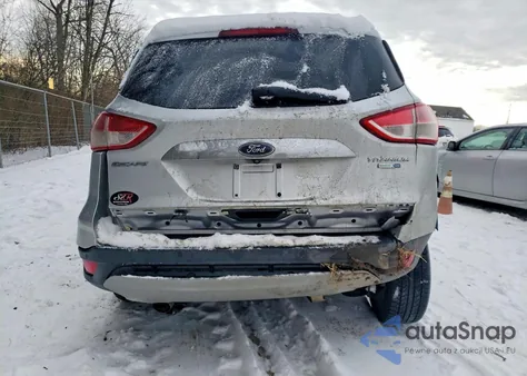 2016 Ford Escape Titanium z USA, uszkodzony, nr VIN 1FMCU9JXXGUA80052